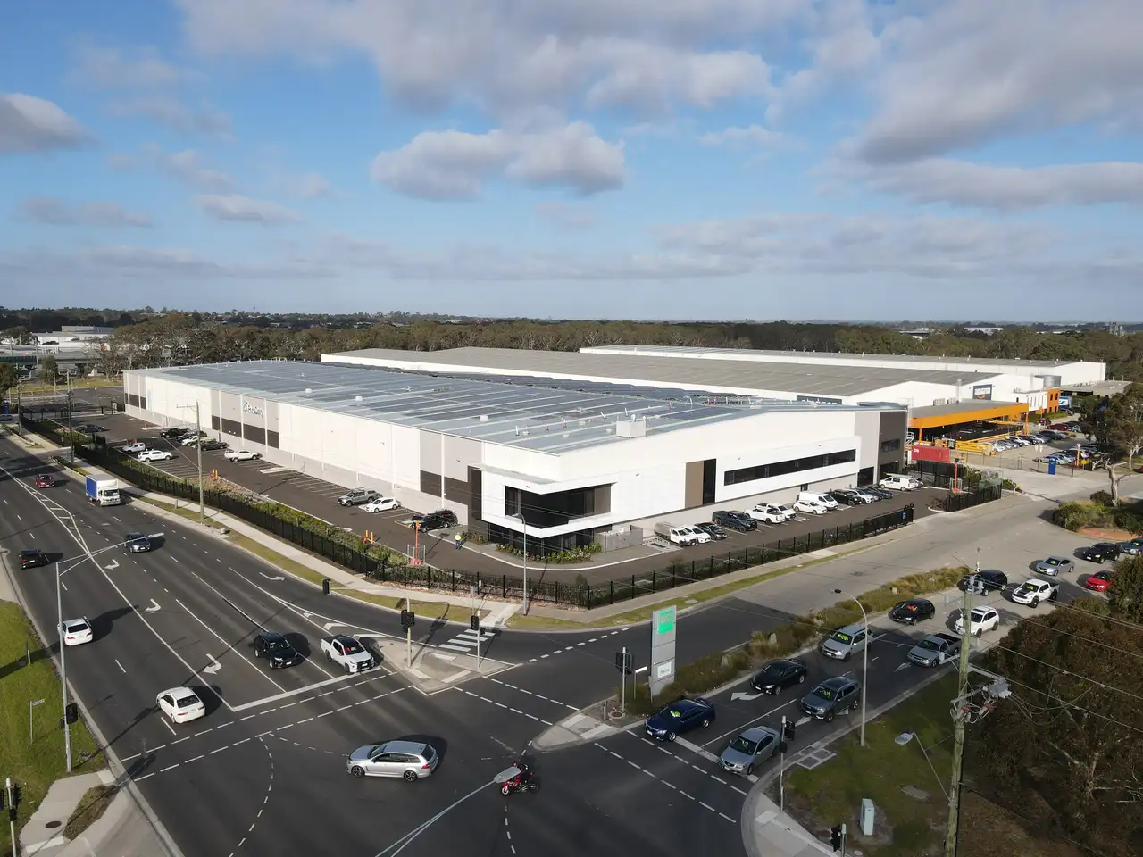 Pellicano_Trust_Pure_Dairy_and_Amazon_Industrial_property_development_Aerial_warehouse_exterior.webp