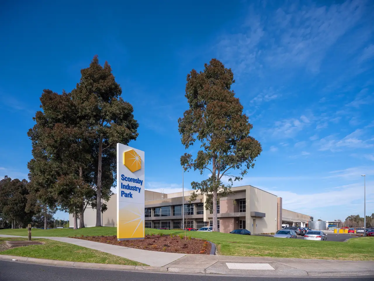 Scoresby_Industry_Park_VIC_Lot_2_Indistrial_Building_Exterior_With_Sign.webp