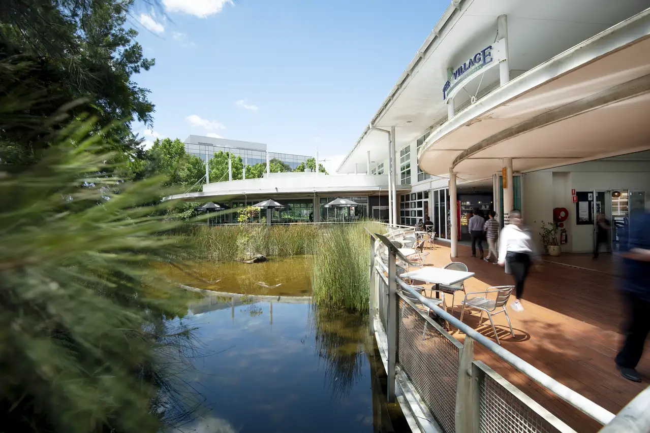 1_Julius _Avenue_North_Ryde_NSW_Building_Exterior_Pond_with_people_walking.webp