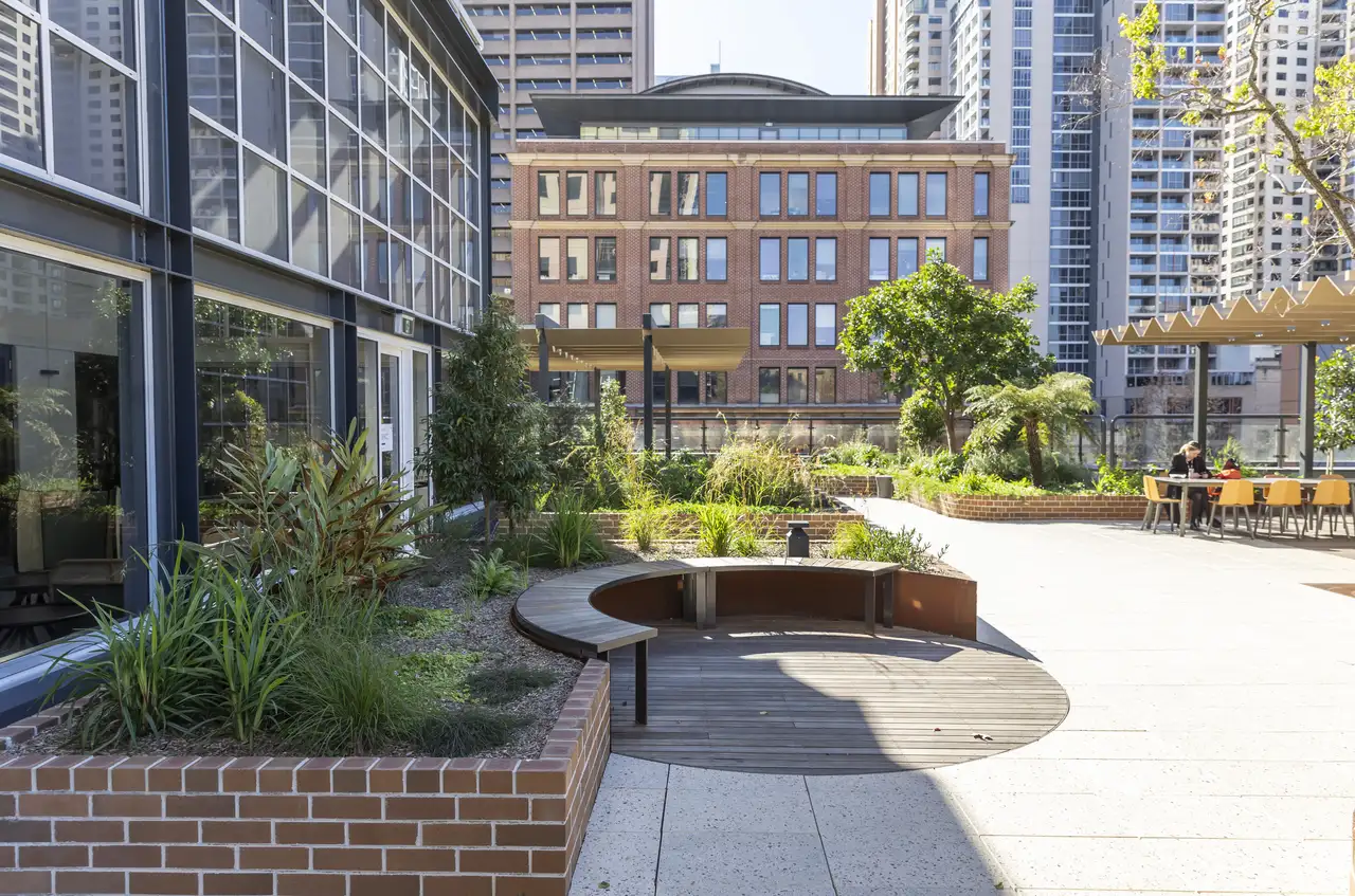 477_Pitt_Street_Sydney_NSW_Building_Exterior_Seating_in_Garden.webp